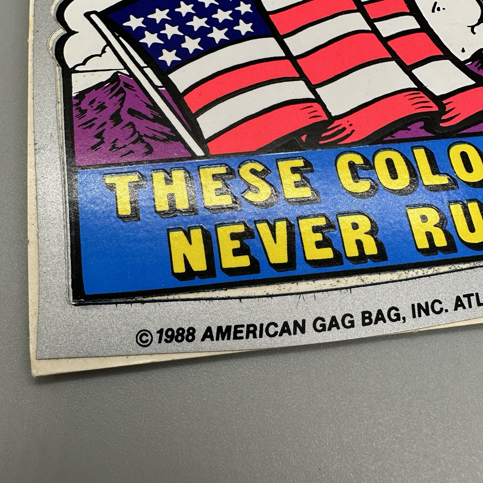 1988 Vintage "These Colors Never Run" US Flag Black Light Retro Vinyl Sticker