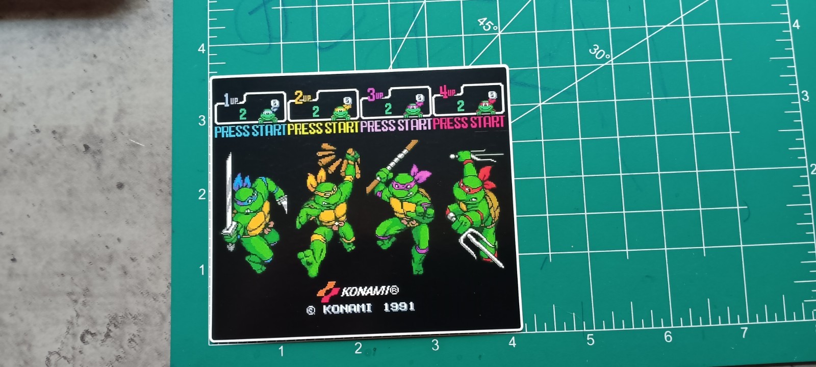 TMNT VYNIL STICKER ( RETRO VIDEO GAME TITLE)