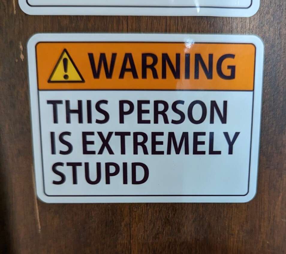 'WARNING THIS PERSON IS EXTREMELY STUPID' 3×2" printed vinyl sticker funny 3 pak