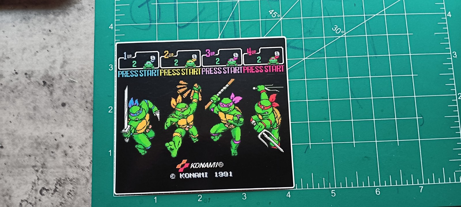 TMNT VYNIL STICKER ( RETRO VIDEO GAME TITLE)