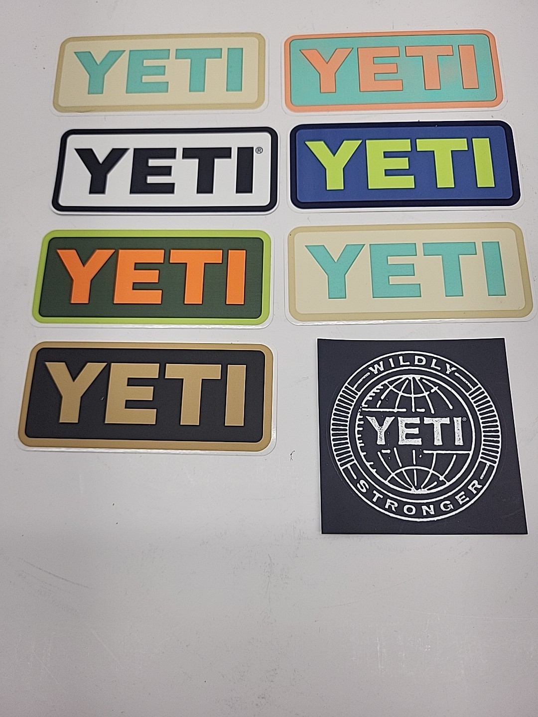 Lot of 8 Authentic YETI decals/stickers – size 4" x 2" – New