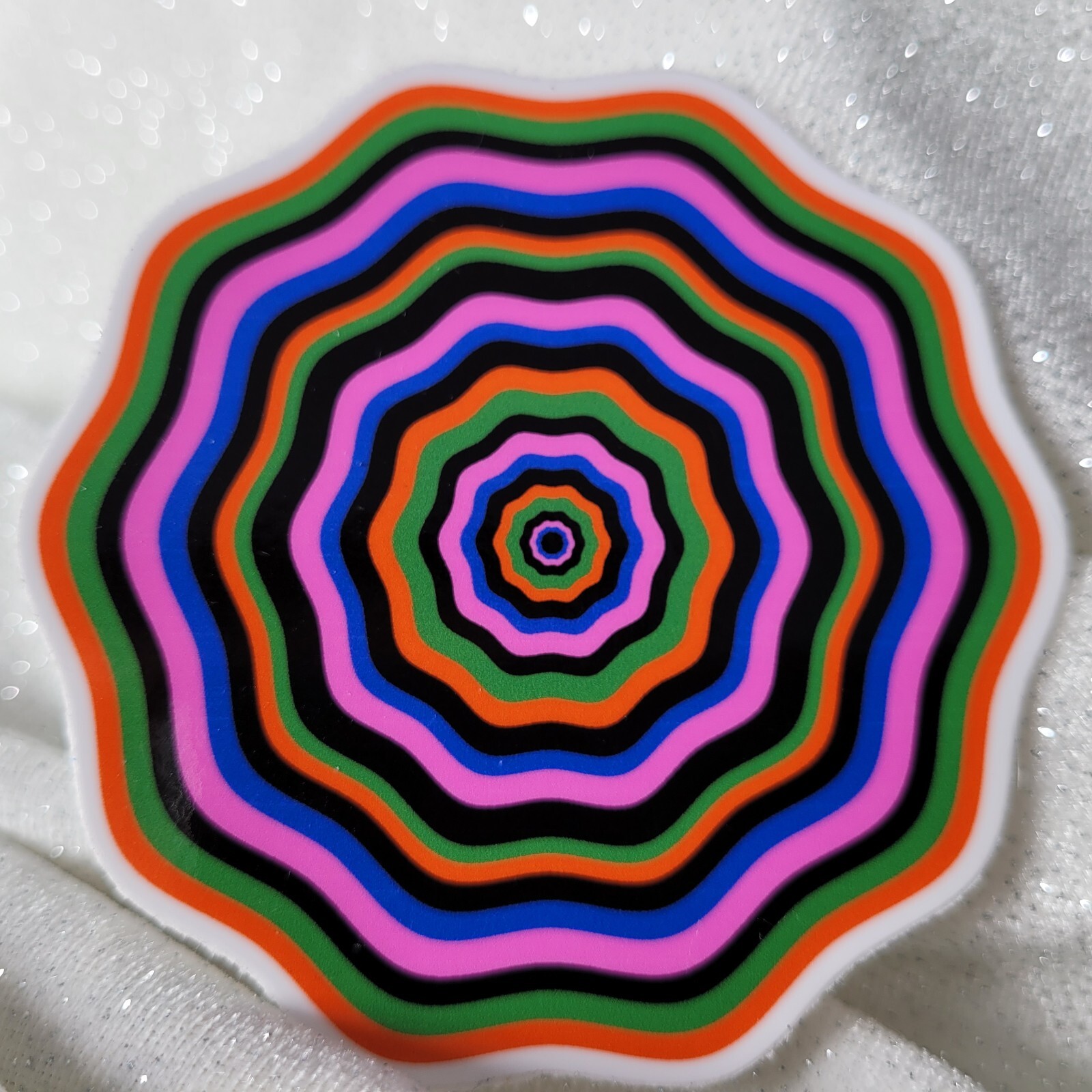 STKR084 Twisted Orange Green Pink Blue Seventies FLOWER Shaped Sticker Illusion