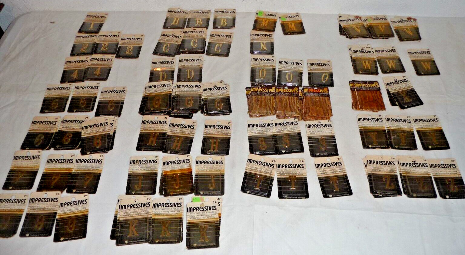 Lot 102 NEW VTG 80’s Moderne Impressives Press-on letters & numbers GOLD Brass