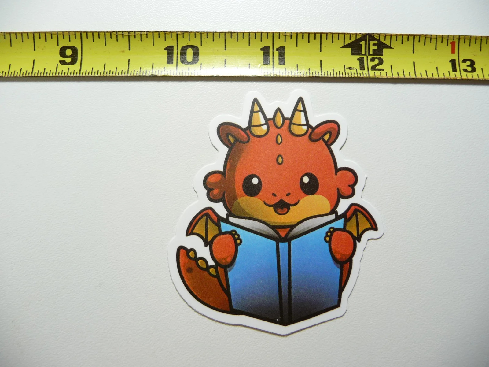 BABY DINOSAUR BOOK SMALL STICKER DECAL READING NOVEL LIBRARY STORY