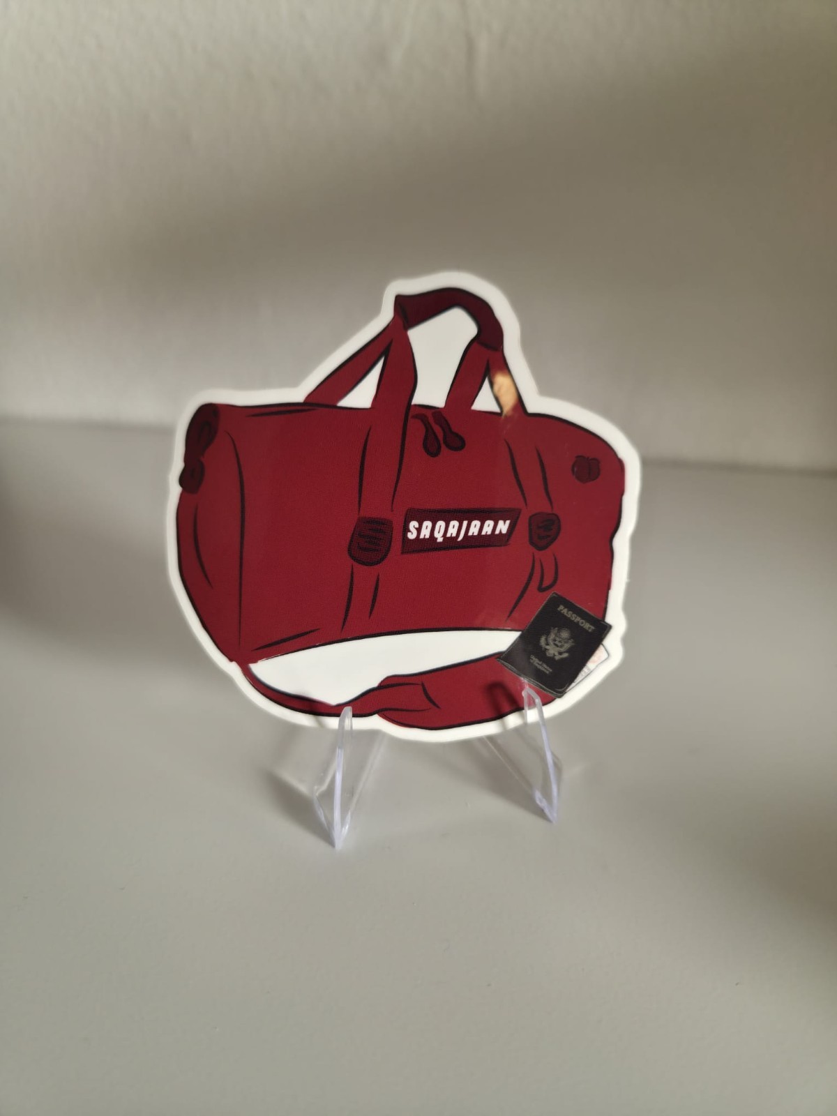 Red Backpack with Passport Sticker 2.5in x 2.5in