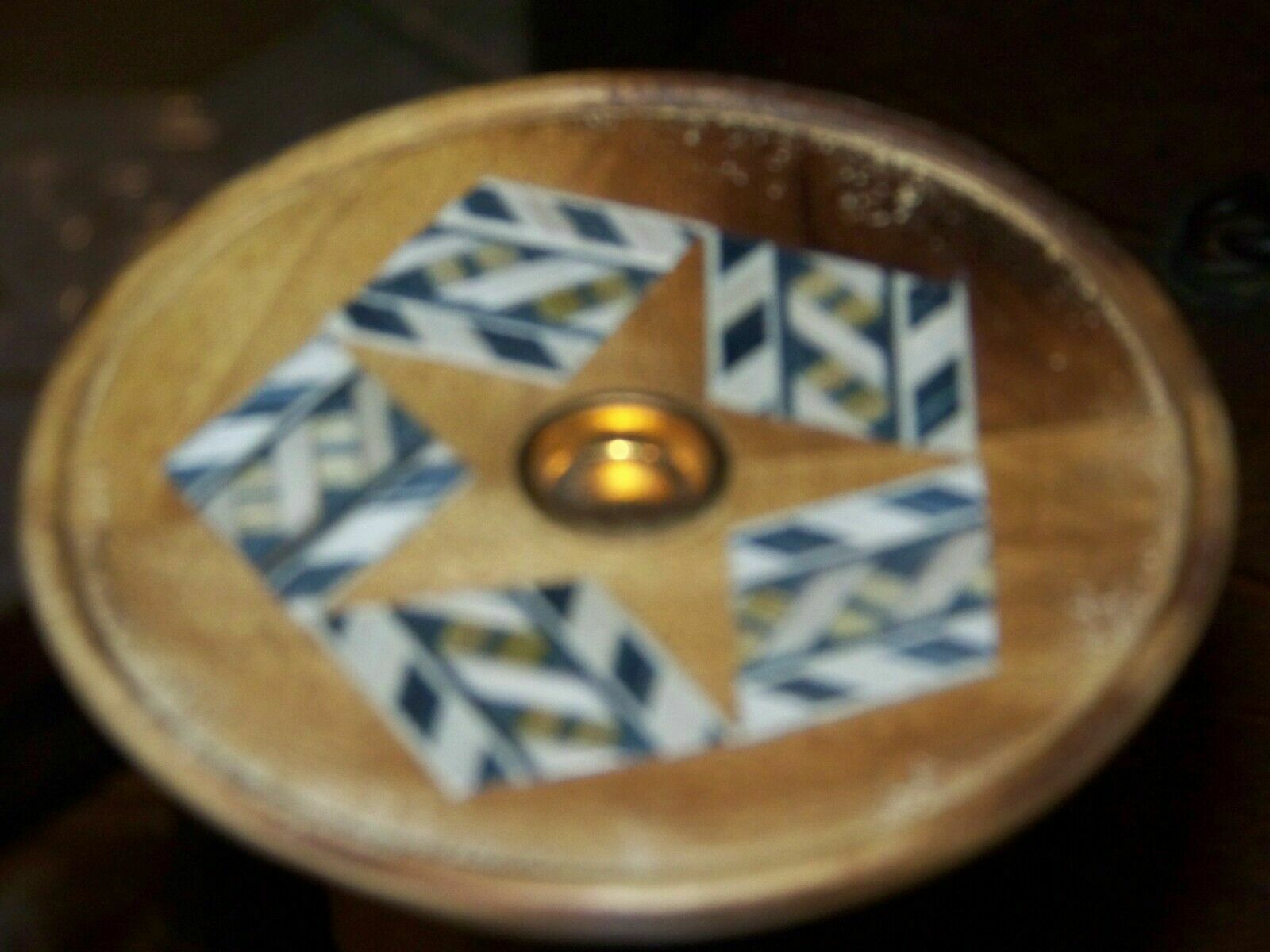 Wooden circle incense cone or stick burner with copper insert and inlay chevrons