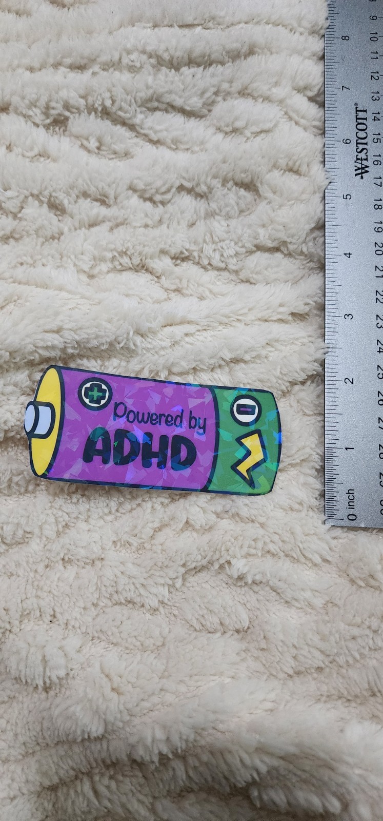 Powered by ADHD Sticker | Yellow, Purple & Green Battery 4×2 Funny Vinyl Decal