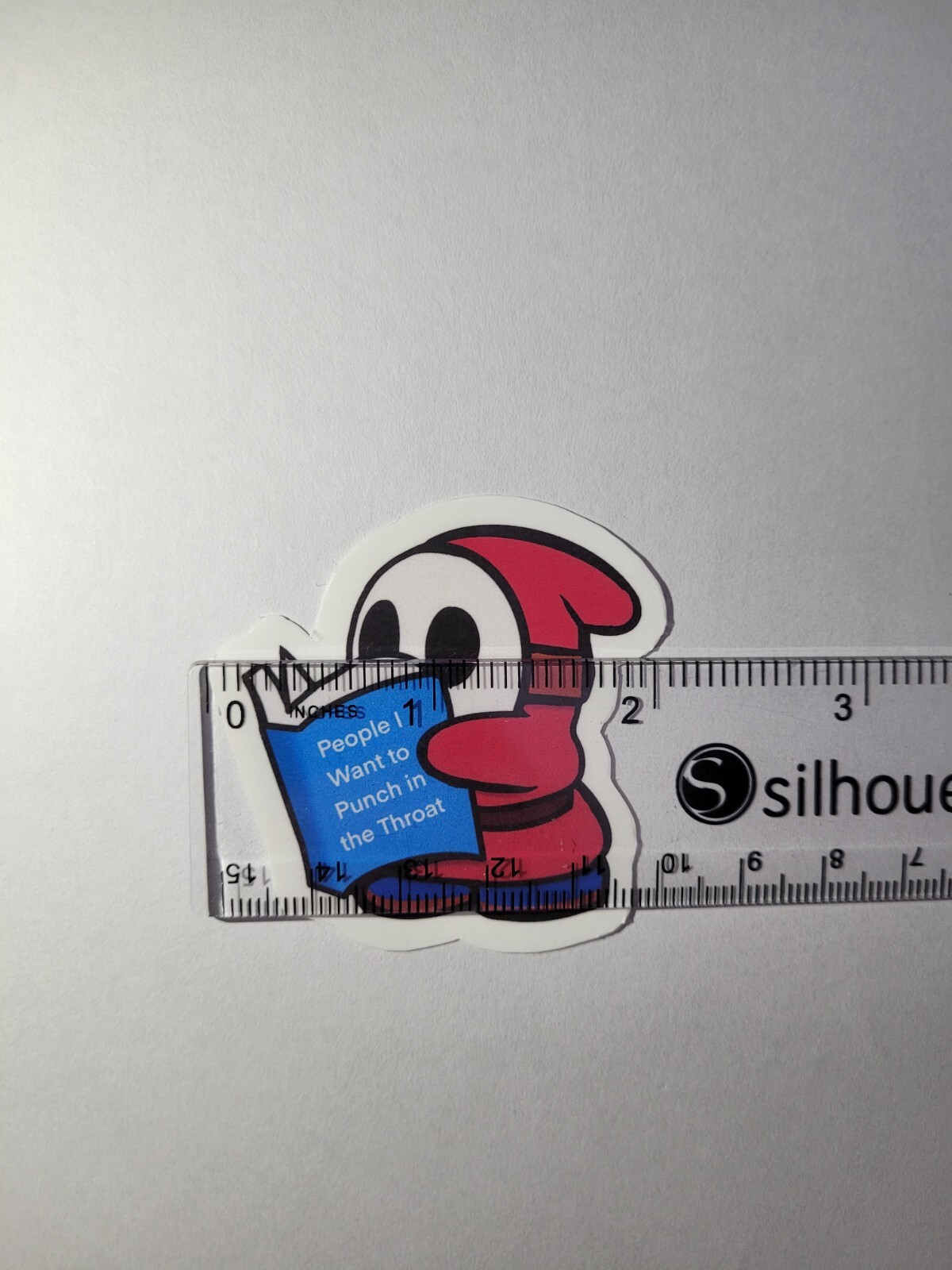 Laminated, Water Resistant, Shy Guy Reading A Book Sticker
