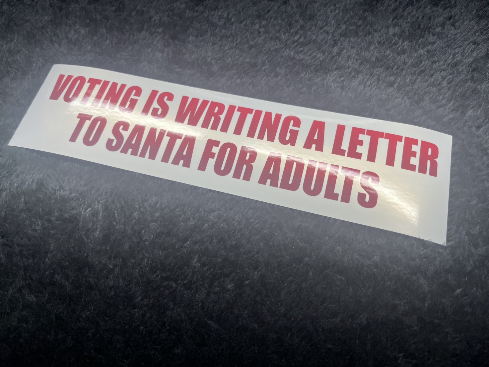 Voting is writing a letter to Santa for adults- Vinyl Bumper Sticker (2.83”x11”)