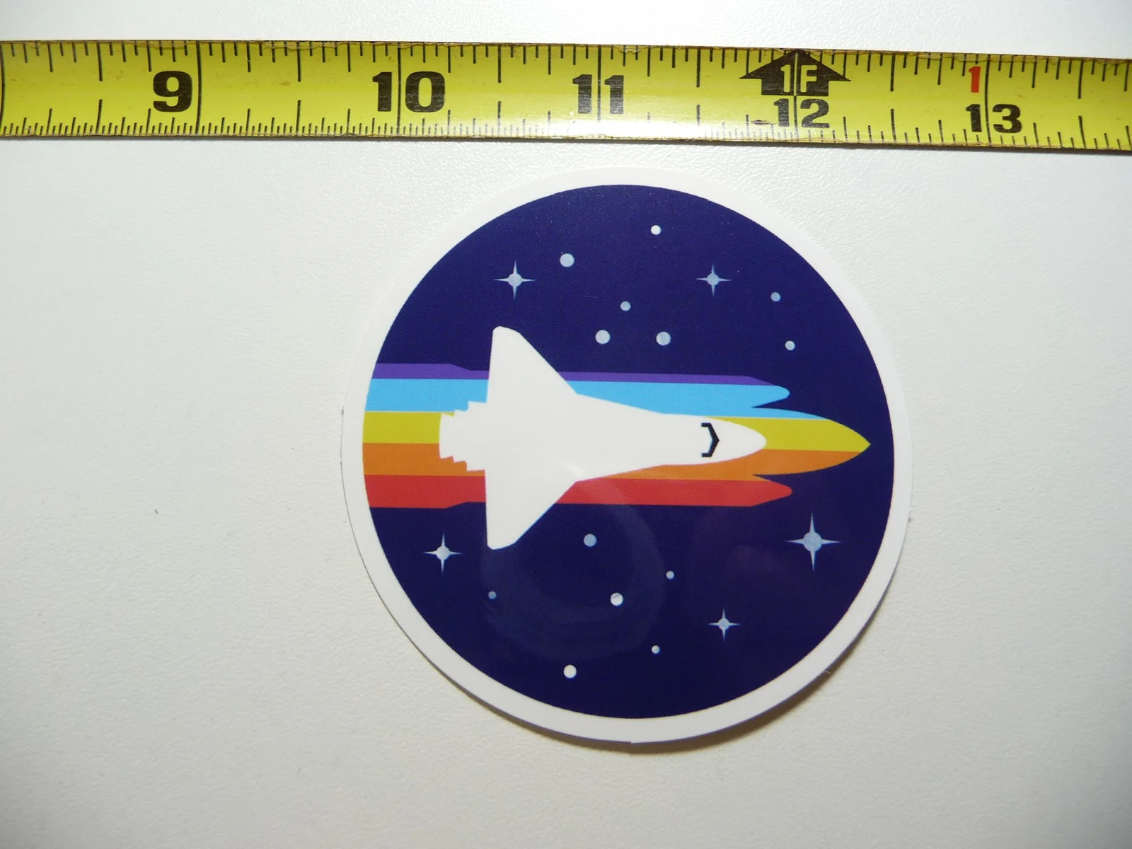 ASTRONAUT SPACE SHUTTLE FLYING SMALL STICKER DECAL EXPLORATION OUTER GALAXY
