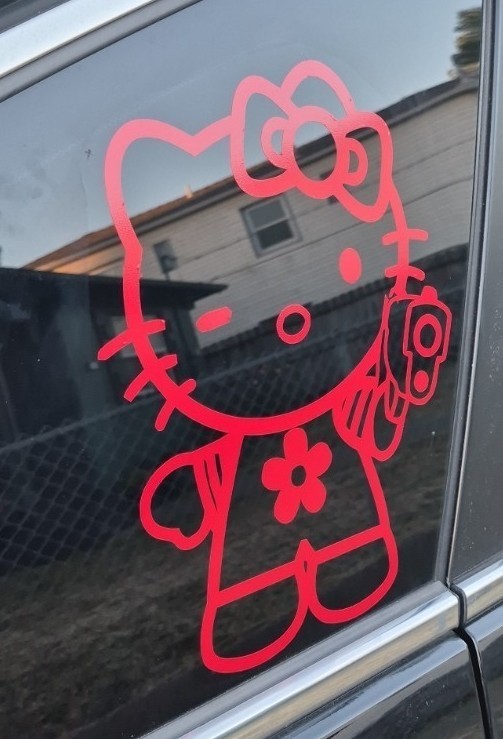 10" Hello Kitty Pistol Gun die cut vinyl decal sticker wall window