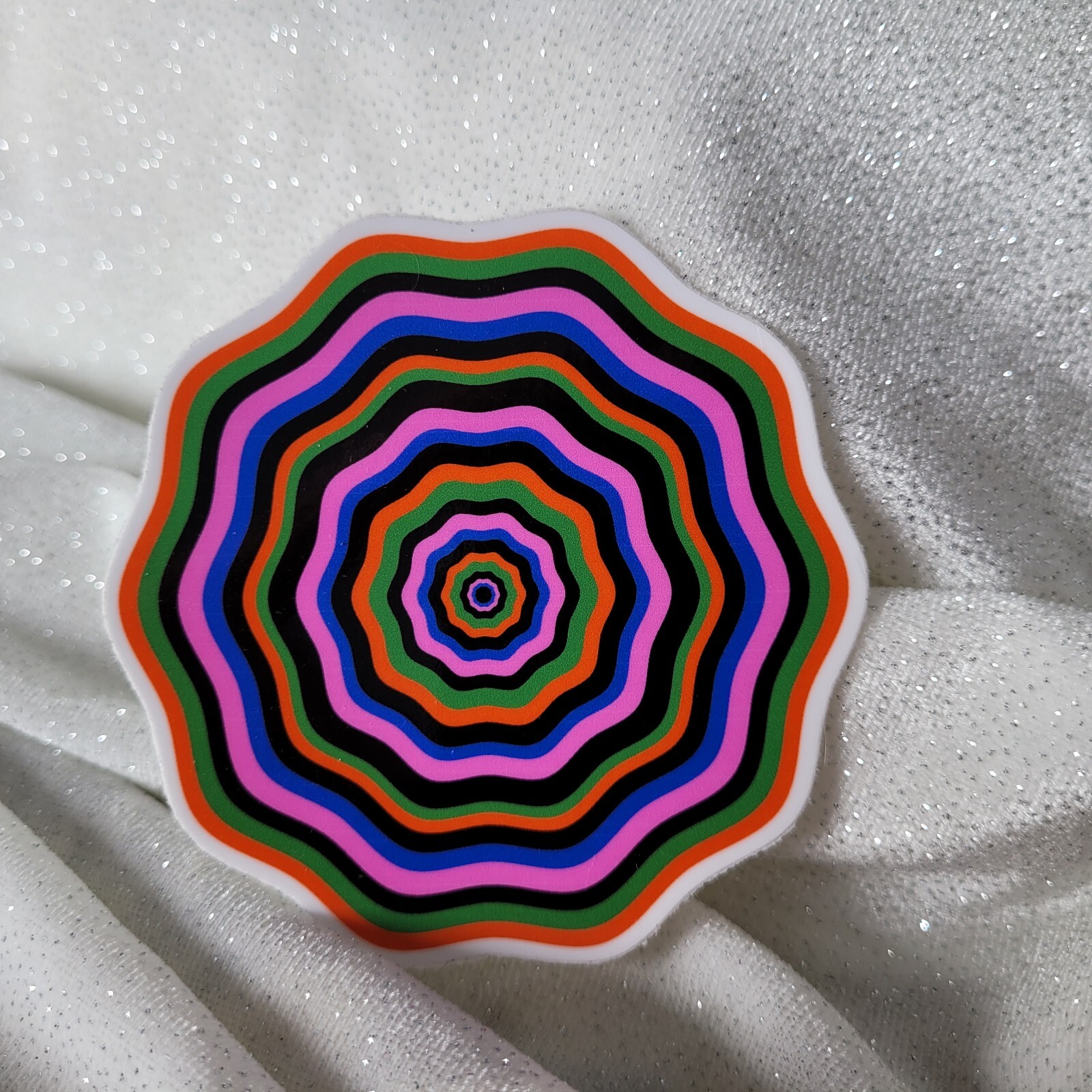 STKR084 Twisted Orange Green Pink Blue Seventies FLOWER Shaped Sticker Illusion
