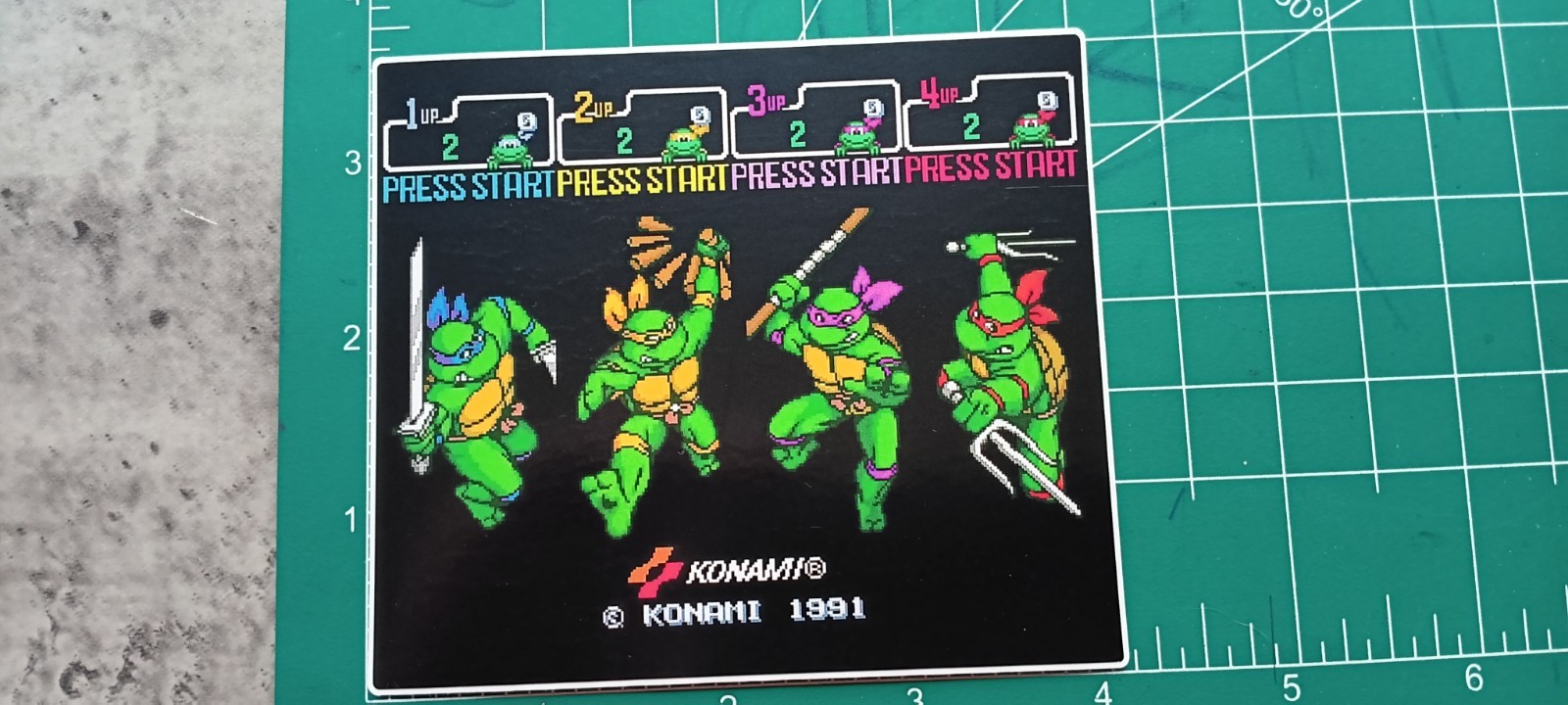 TMNT VYNIL STICKER ( RETRO VIDEO GAME TITLE)