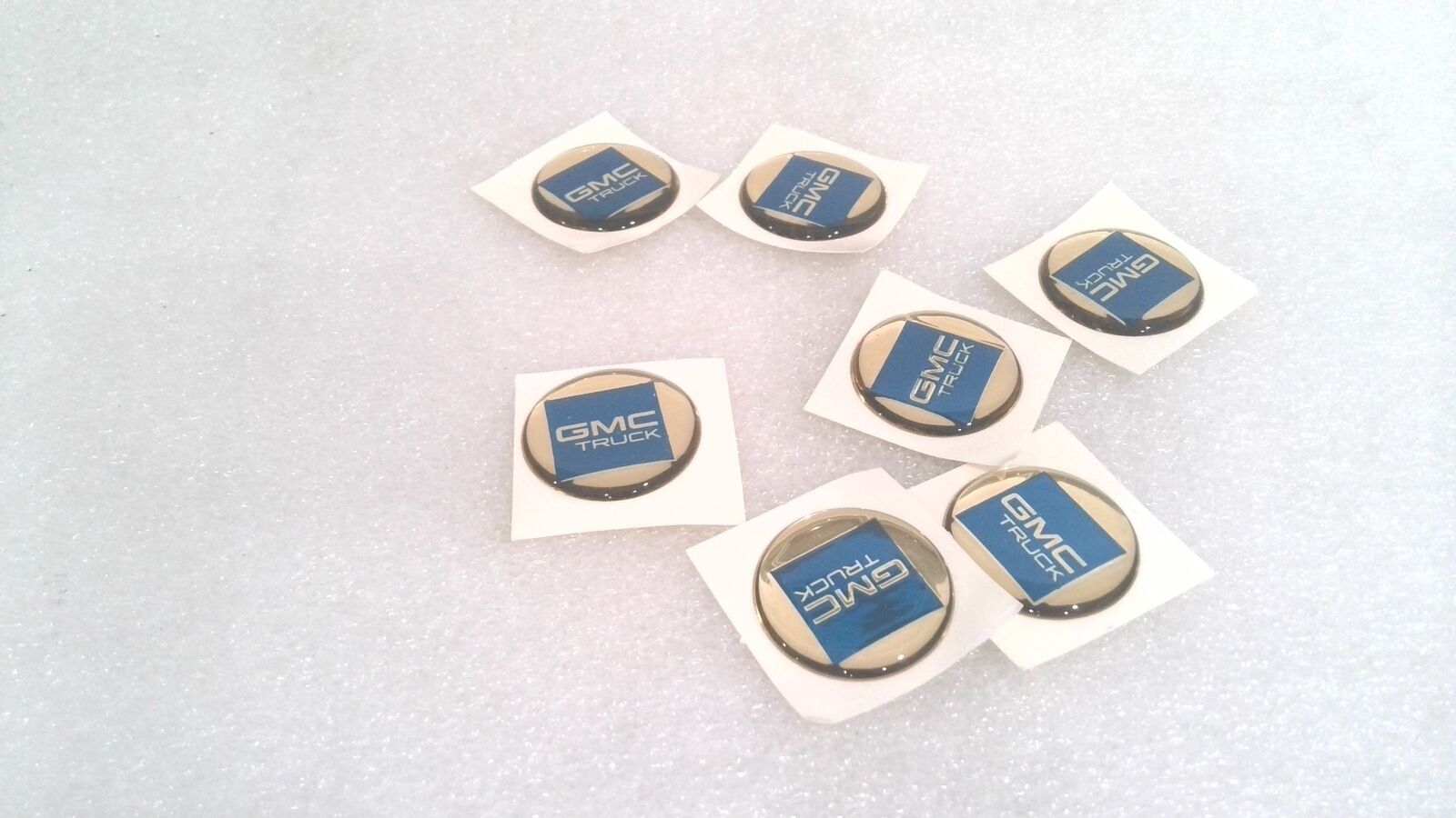 GMC TRUCK DOMED STICKER, GOLD/BLUE, 2 MM X 1.1" (LOT OF 14)