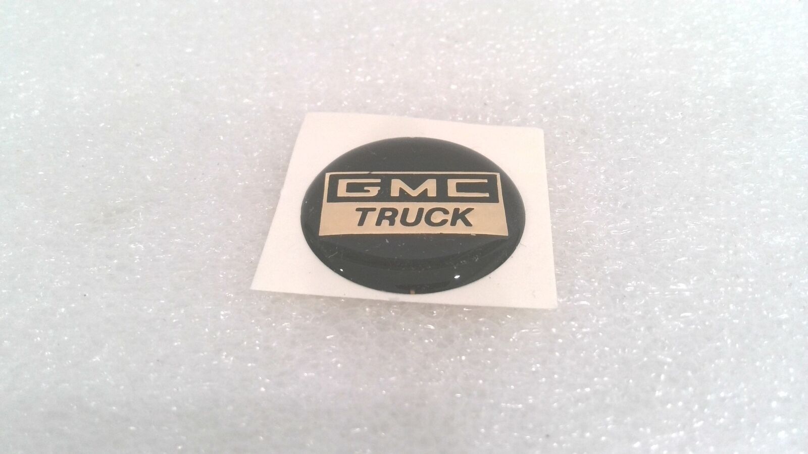 GMC TRUCK DOMED STICKER, BLACK/GOLD, 2 MM X 1.1" (LOT OF 18)