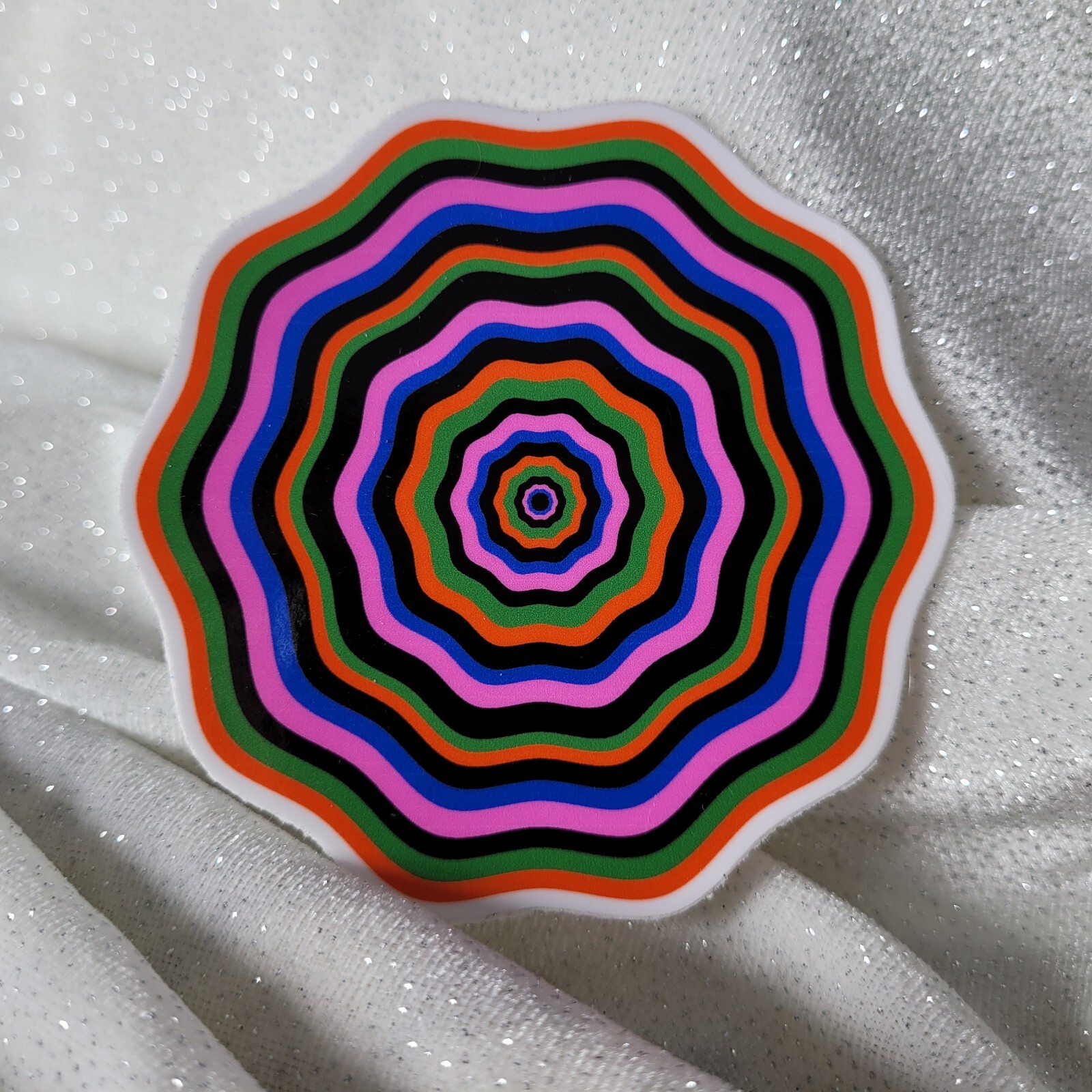 STKR084 Twisted Orange Green Pink Blue Seventies FLOWER Shaped Sticker Illusion