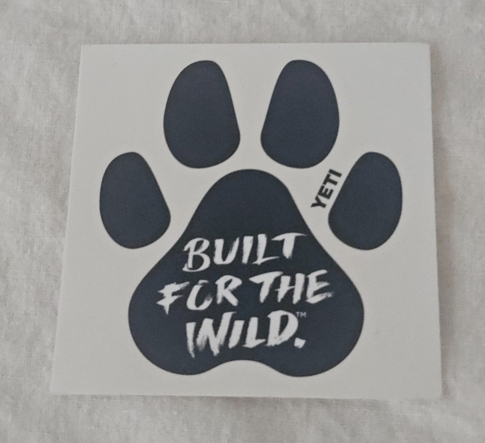 YETI Authentic Sticker Built For The Wild Dog Paw Swag New Decals Logo
