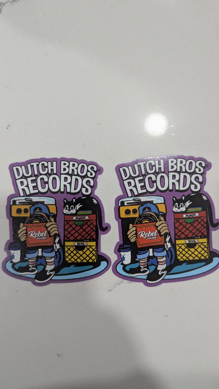 DUTCH BROS MAY 6 2026 "Dutch Bros Records" Rebel Volume I Sticker Lot Of (2)