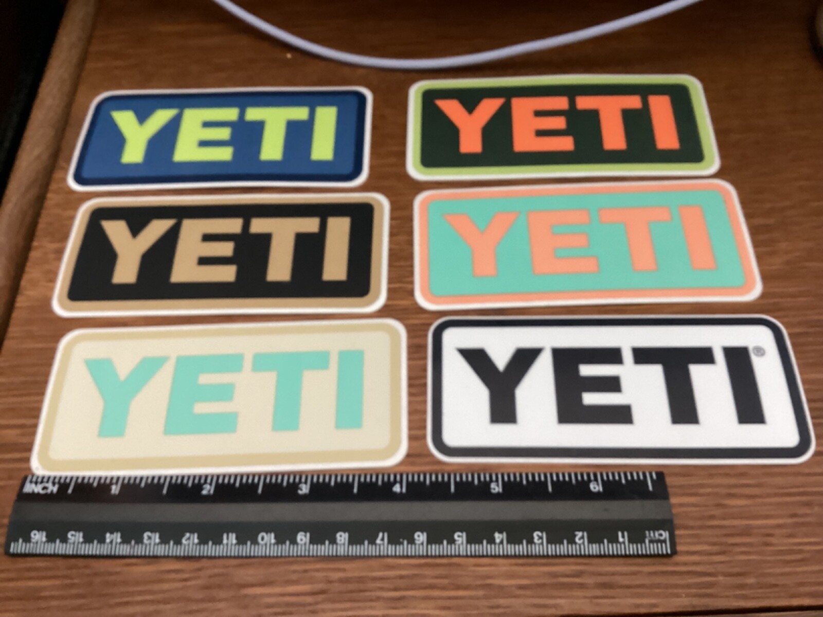SIX DIFFERENT 4 X 1.75 INCH YETI STICKERS