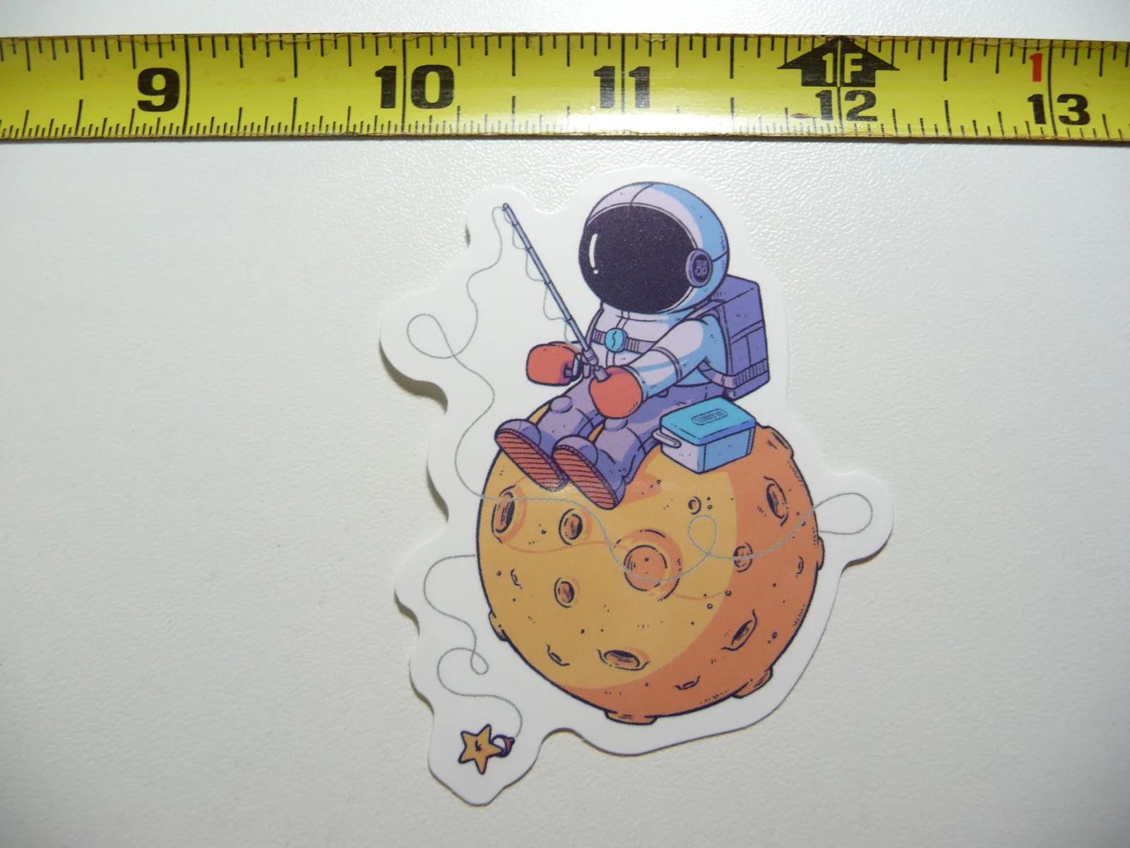 ASTRONAUT FISHING ASTEROID SMALL STICKER DECAL EXPLORATION OUTER GALAXY UNIVERSE