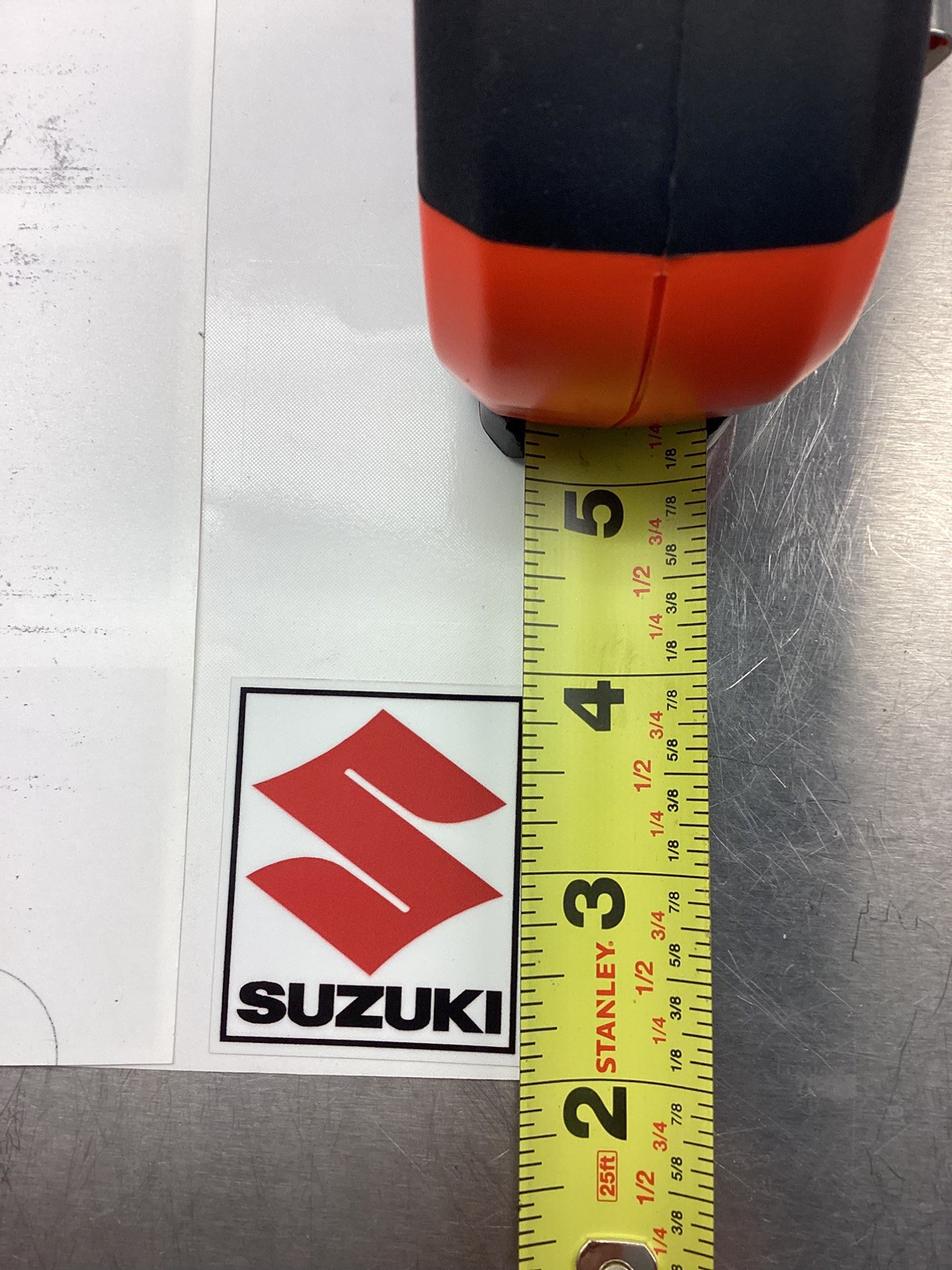 A Pair of Vintage Suzuki Red S Logo Decal Stickers 125 250 370 400