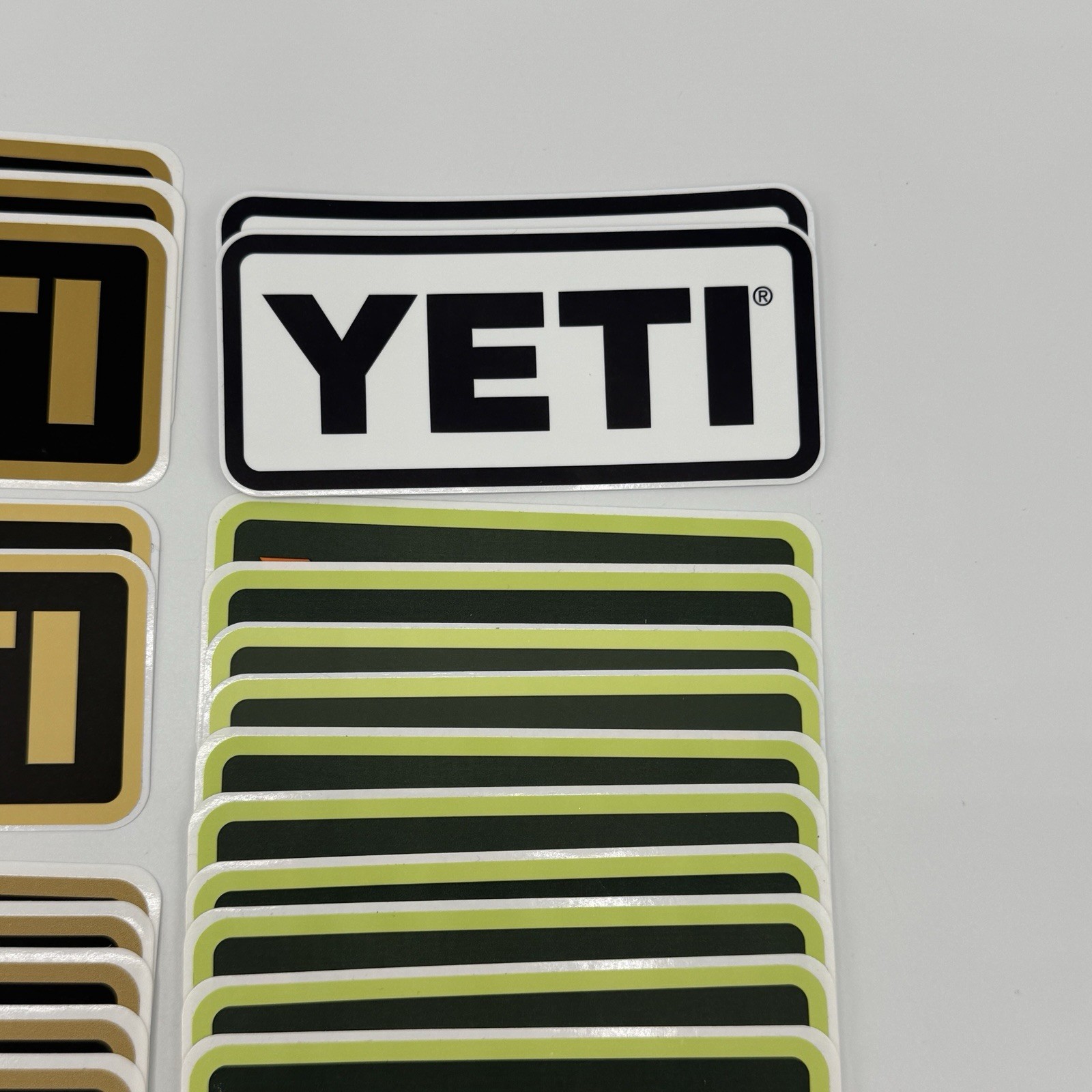 YETI Logo Stickers Decals Lot of 24 – Assorted Colors Tan Orange Black