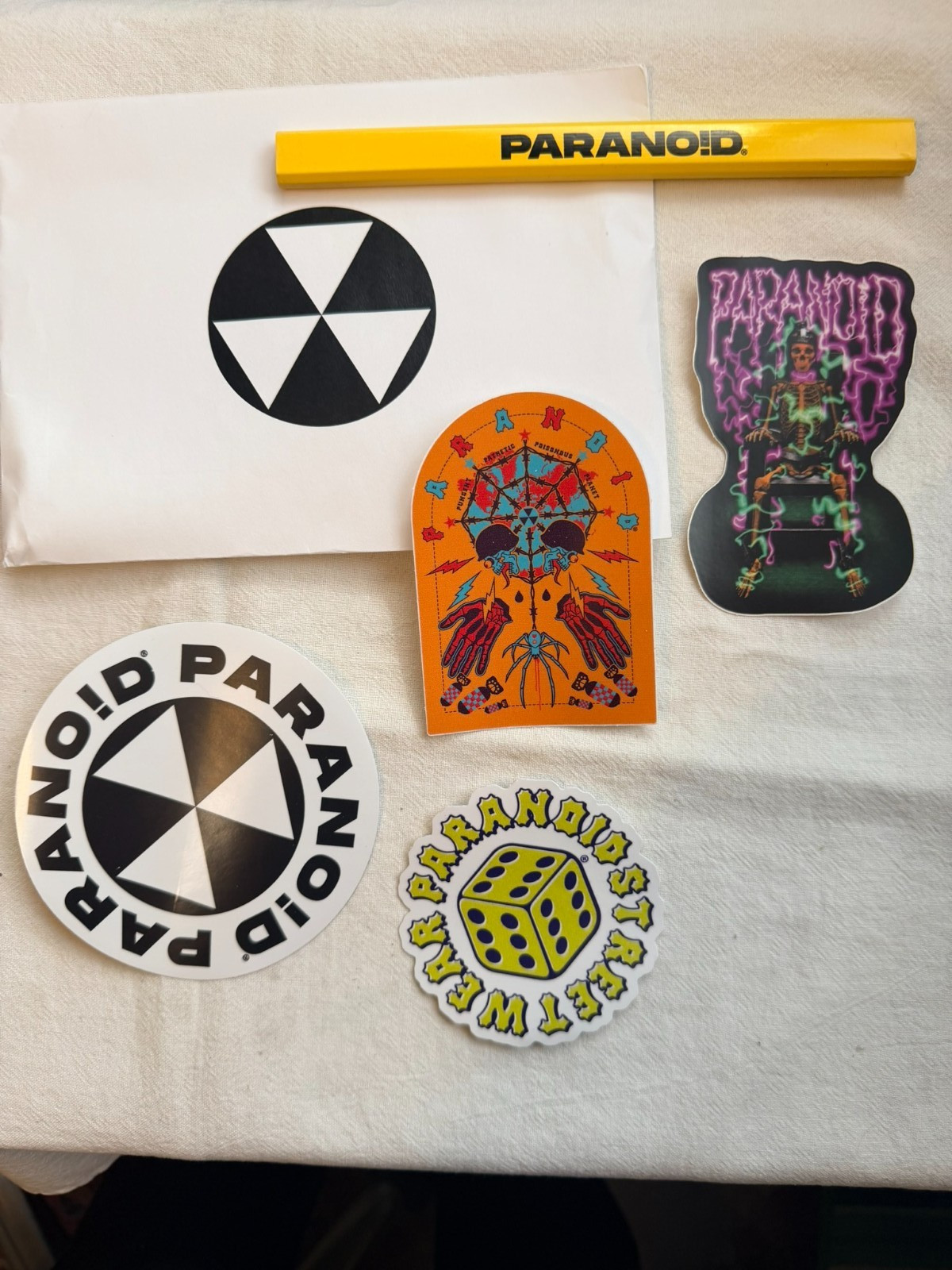 PARANOID sticker set 4 stickers and flat unsharpened pencil in envelope
