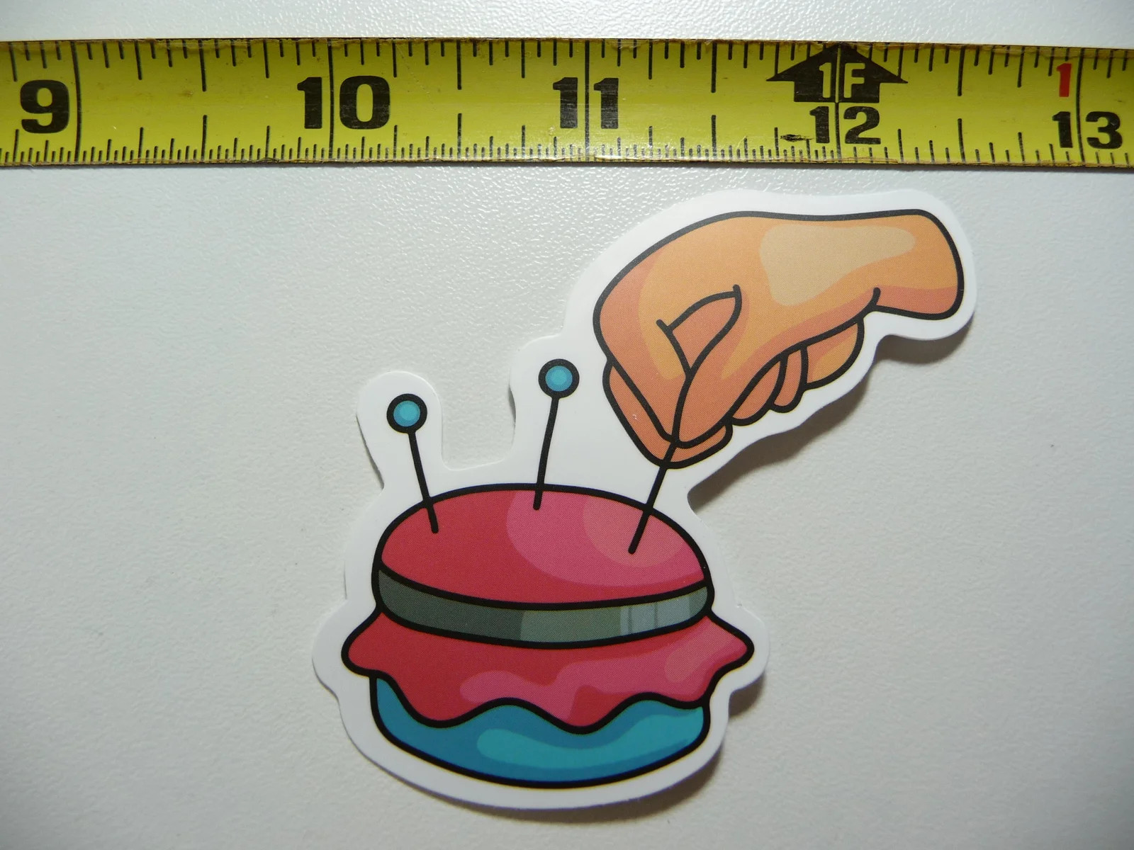 HAND WITH PIN CUSHION SMALL STICKER DECAL SEWING SEW CLOTHING SEAMSTRESS
