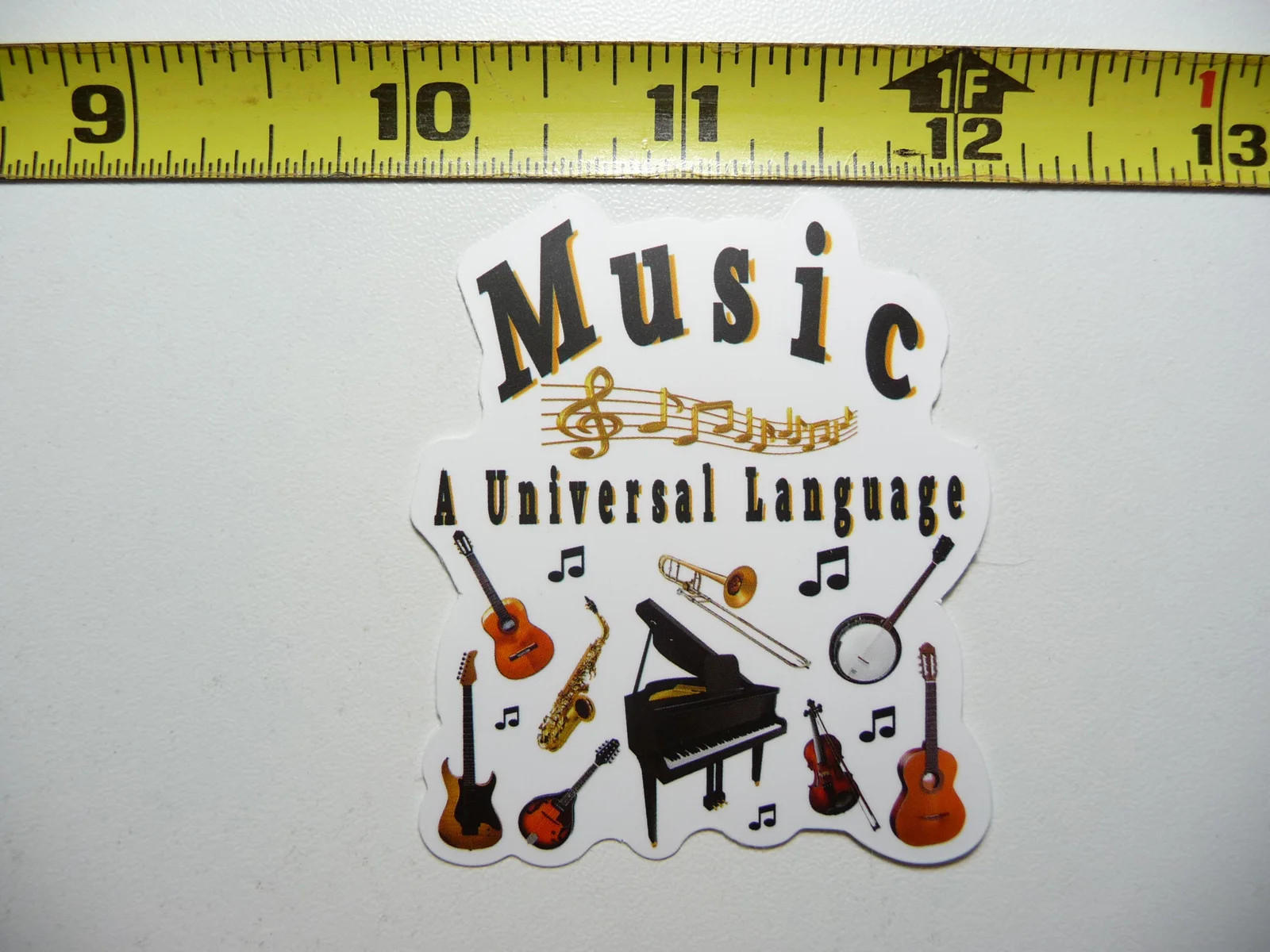 MUSIC A UNIVERSAL LANGUAGE VARIOUS INSTRUMENTS SMALL STICKER DECAL BANDMUSICIAN