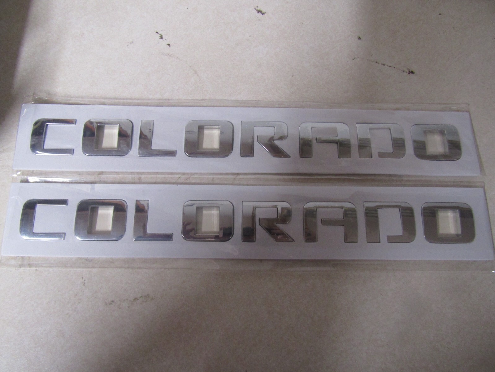 SET OF 2 PRESS ON DECAL STICKERS (FOR: COLORADO) ONE INCH LETTERS 12 INCHES LONG