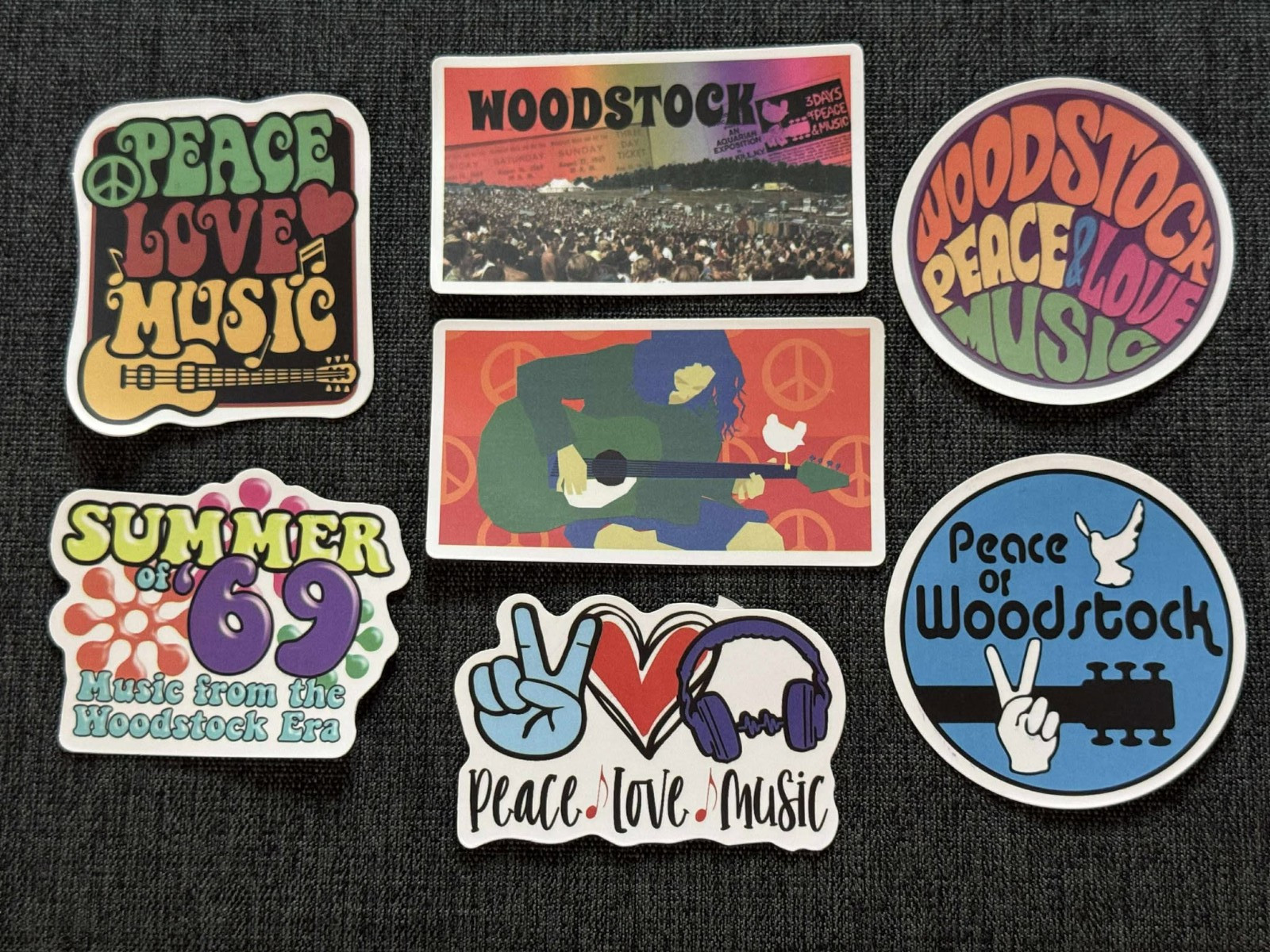 Lot of (7) WOODSTOCK Festival 1 1/2" to 2 7/8" Logo STICKERS Fast! FREE SHIP!