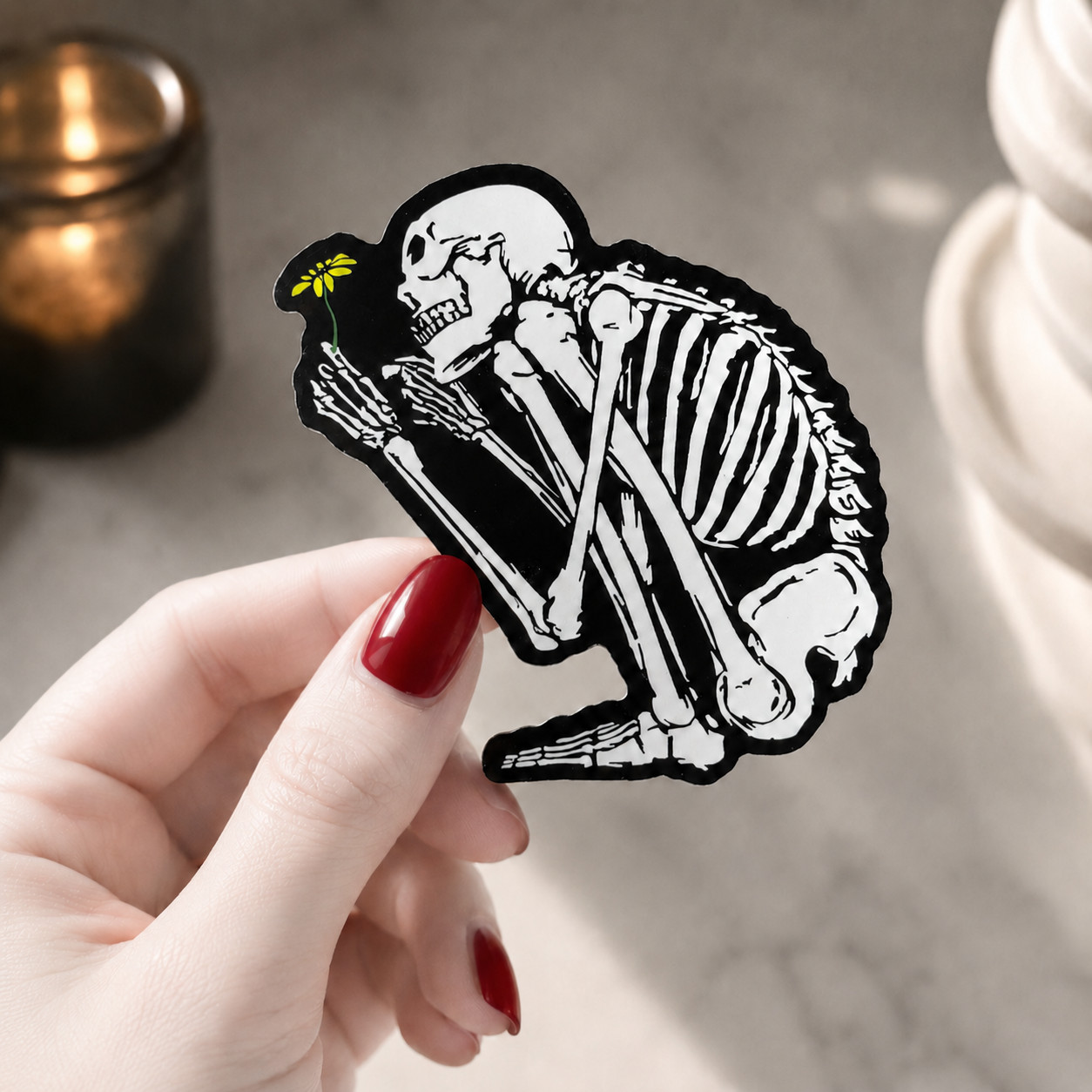 Crouching Skeleton Holding Flower Vinyl Sticker Gothic Art Decal for Laptops 4in