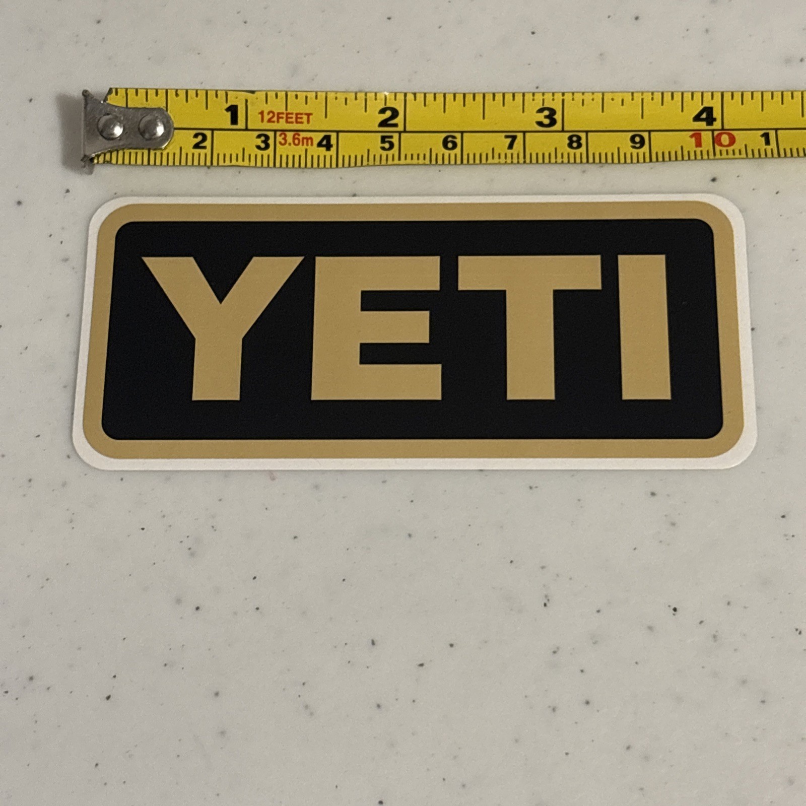 New YETI Sticker – Logo Tan Black – Official For Camping Cooler Bottles Mugs