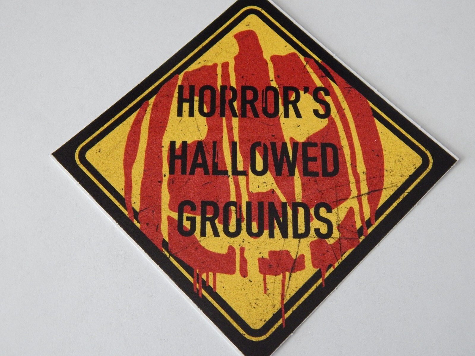 Horror's Hallowed Grounds Pumpkin Halloween Sticker 4" X 4" Red Yellow Black New