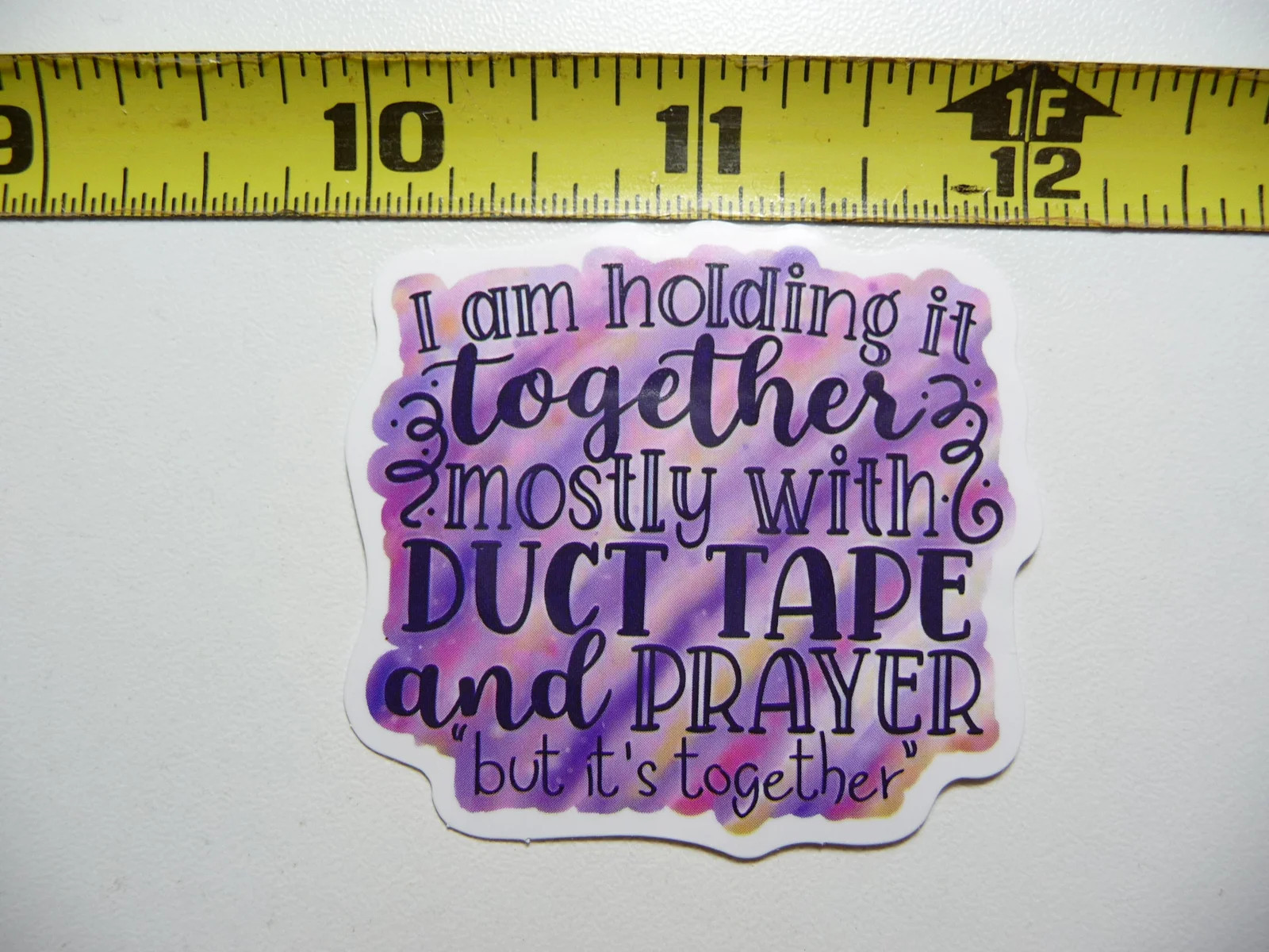 HOLDING IT TOGETHER WITH DUCT TAPE AND PRAYER SMALL STICKER DECAL FUNNY SAYING