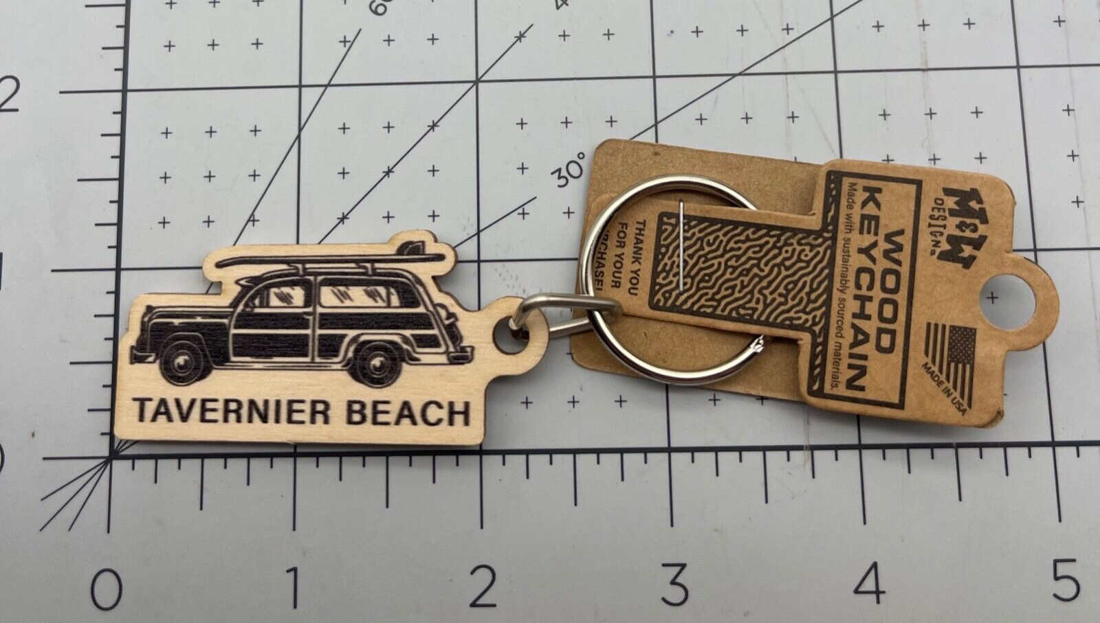 Metal and Wood Co Keychain Travel Tavernier Beach Surf Board on top of car