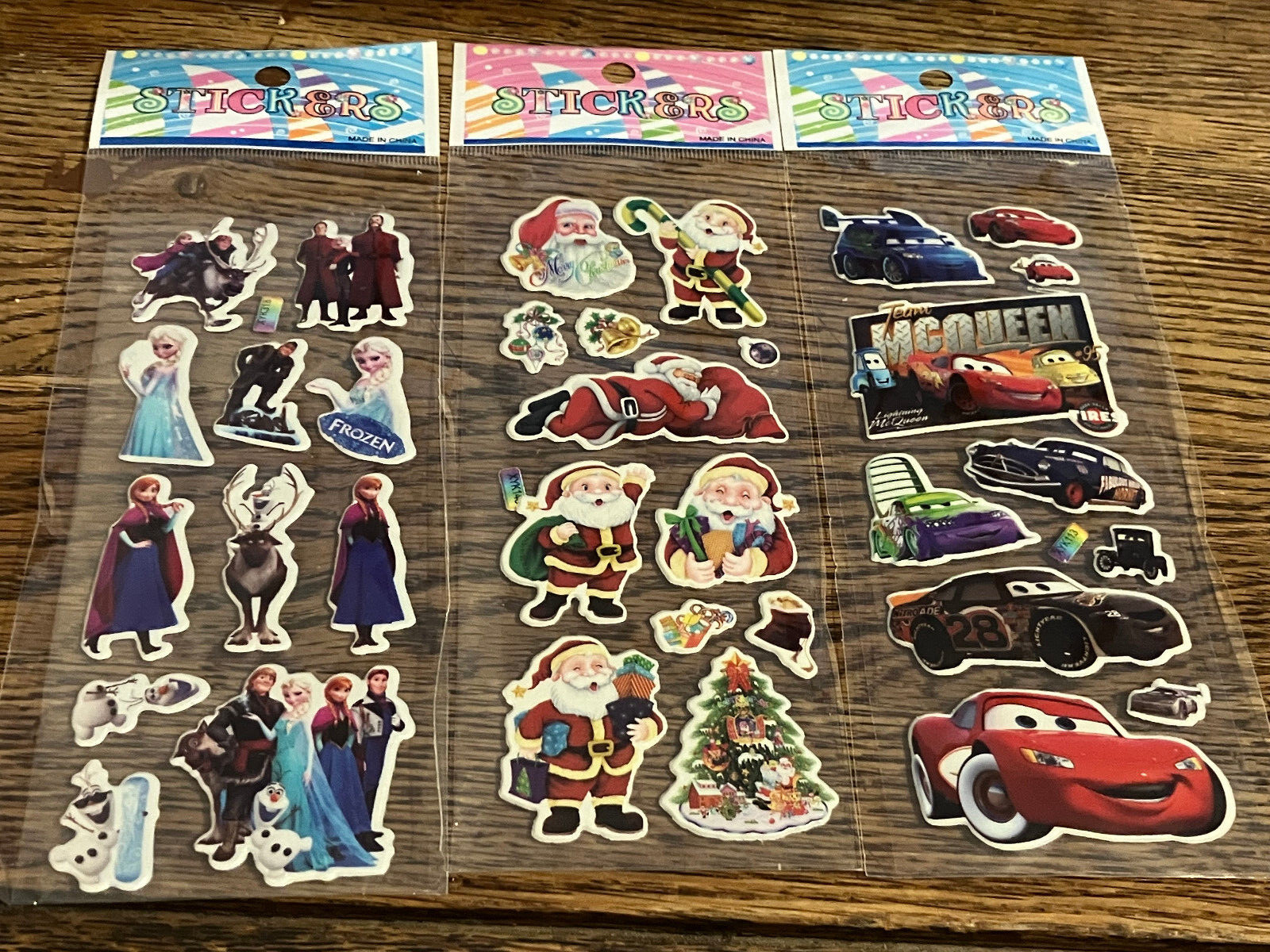 Lot Of 25 Decal Stickers SANTA CARS SUPERMAN FISH HULK SPIDERMAN MOTORCYCLE CAT