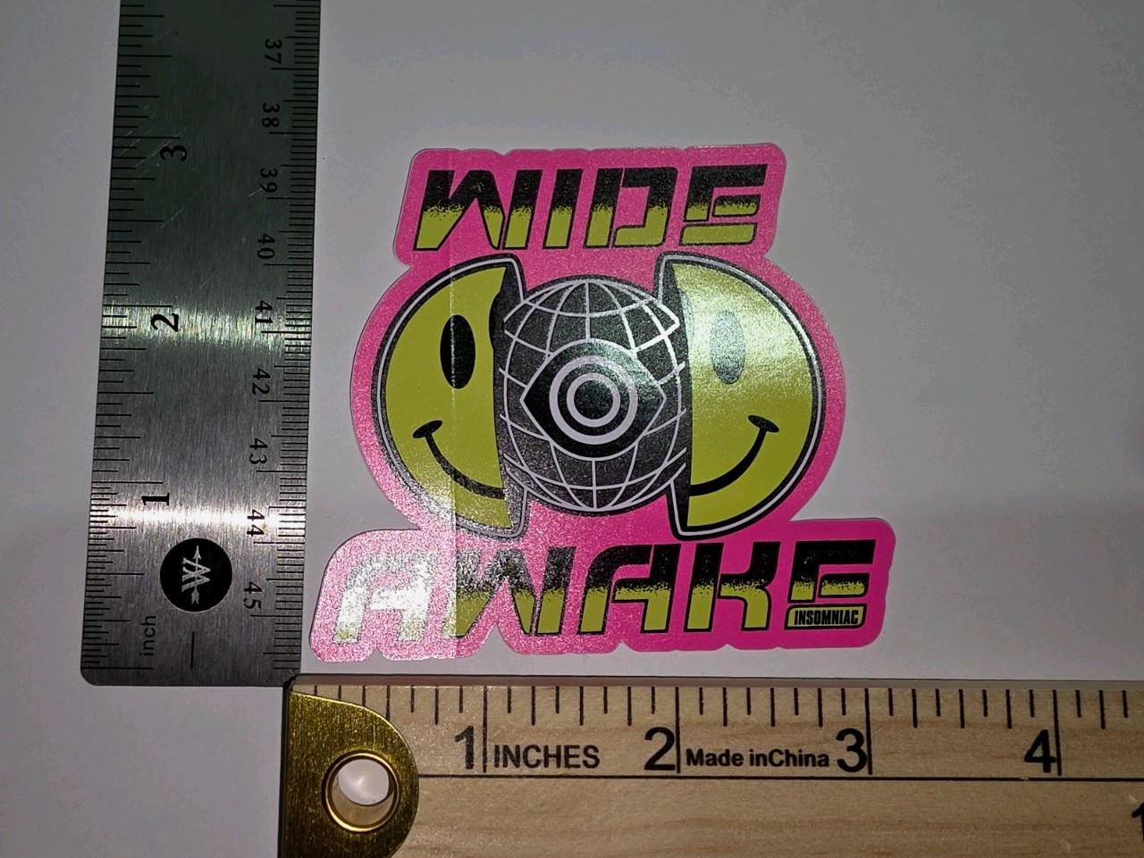 EDC Insomniac Wide Awake Smiley Face Pink Yellow Black Vinyl Sticker