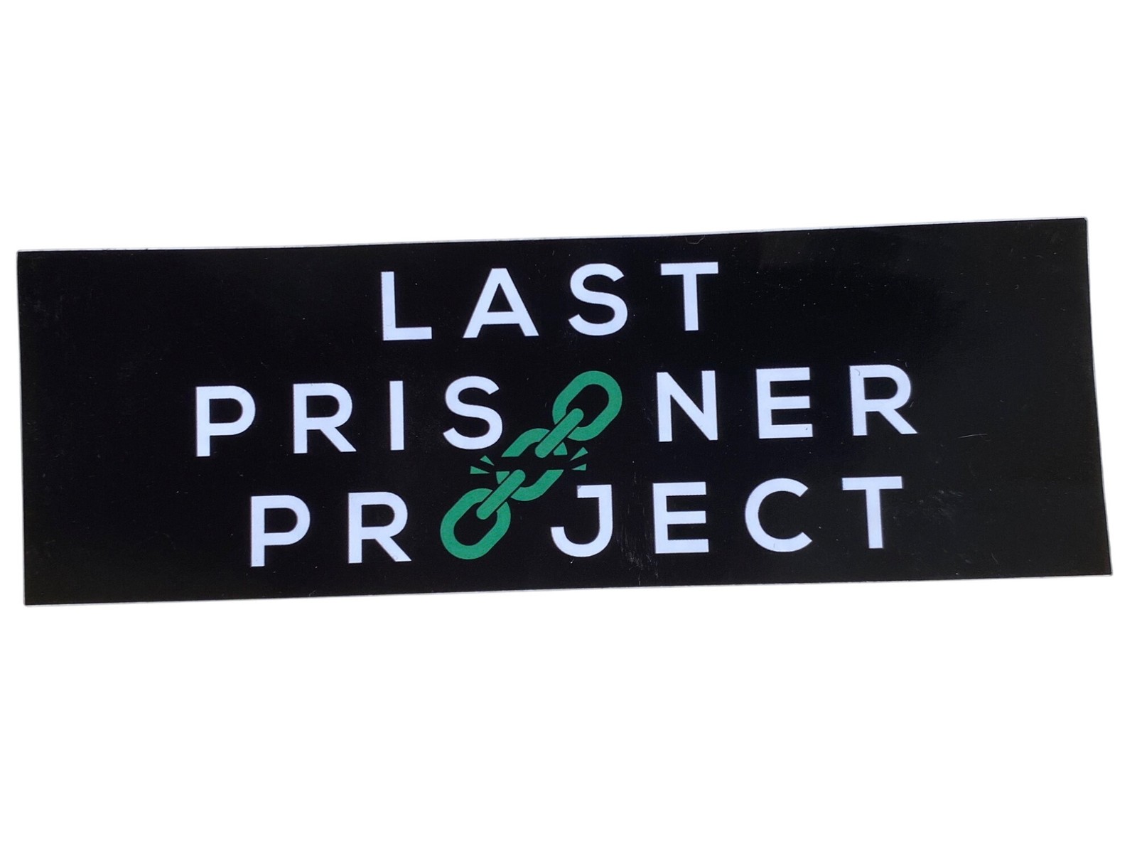 Last Prisoner Project Rectangular Vinyl Sticker 6"x2" Black With Green Chain