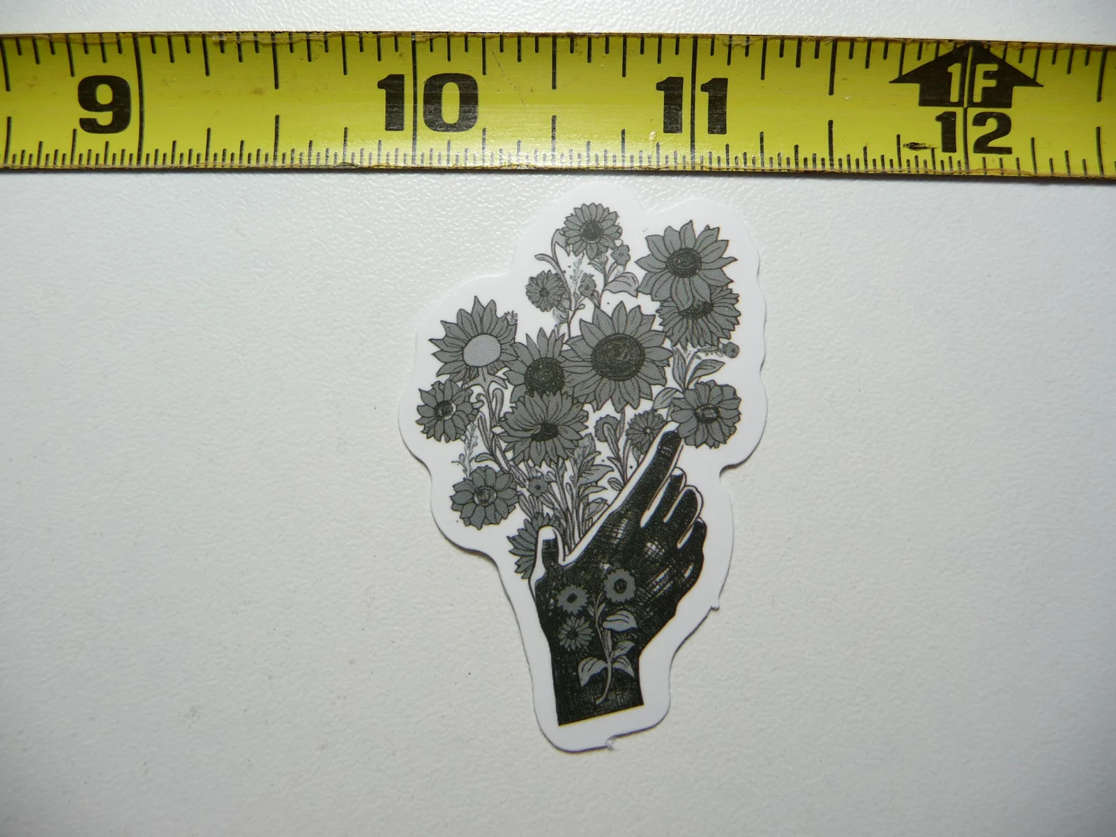 HAND WITH WILD FLOWERS SMALL STICKER DECAL NATURE OUTDOORS FUN CALMING